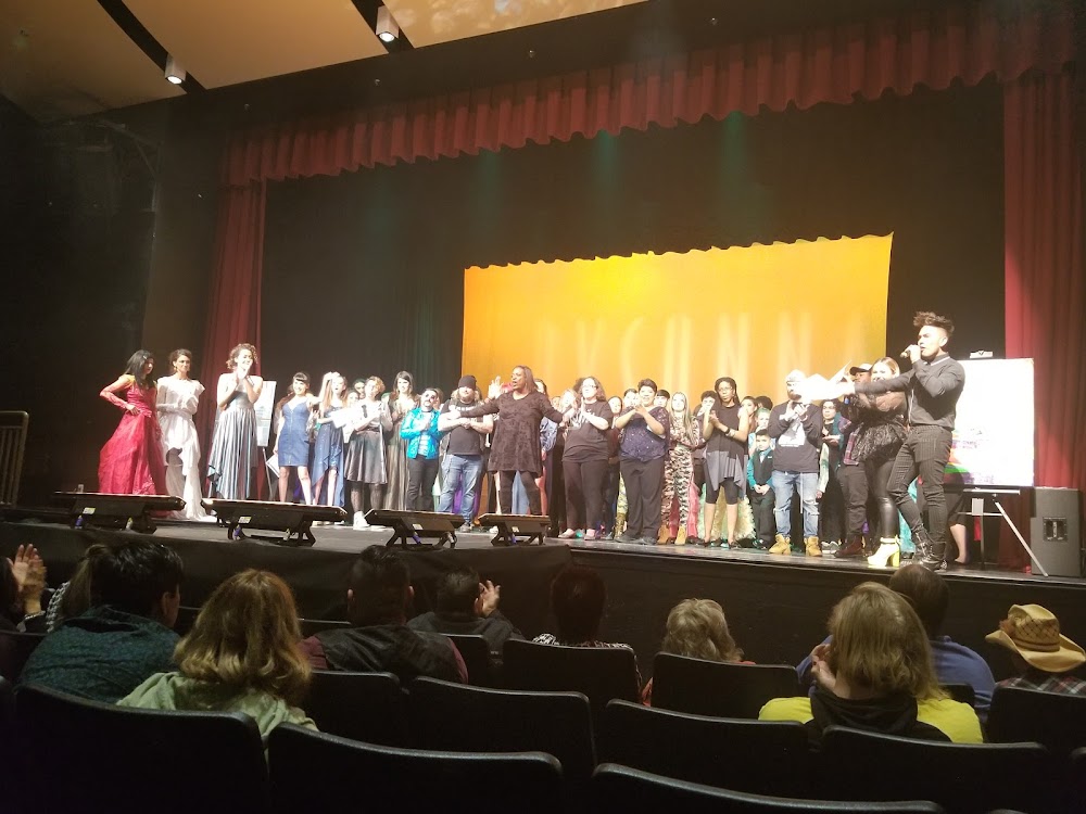 A bunch of people gathered on the AAPAC stage